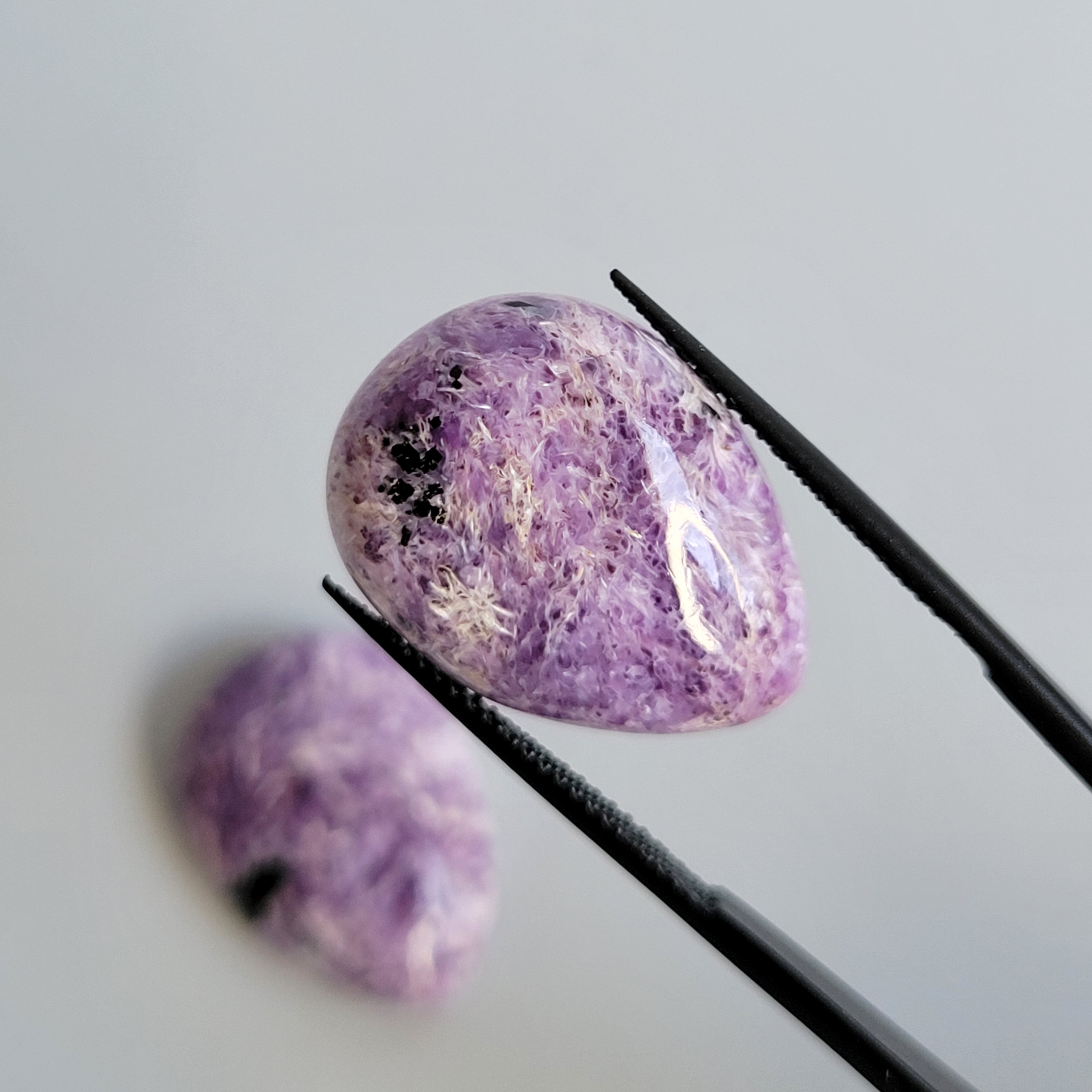 31.48tcw matching pair of Charoite Cabochons