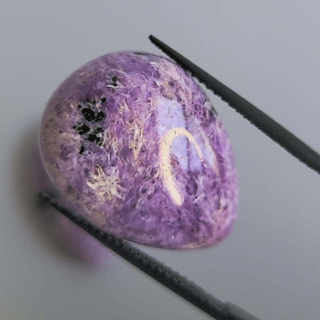 31.48tcw matching pair of Charoite Cabochons